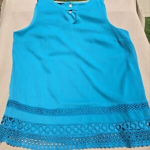 Sleeves top fully lined with lace bottom and two button closure at back.